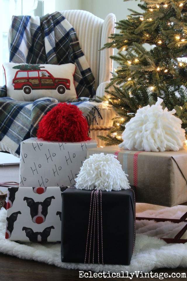 See how to make these huge pom poms! They are so fun and make the perfect gift toppers! kellyelko.com