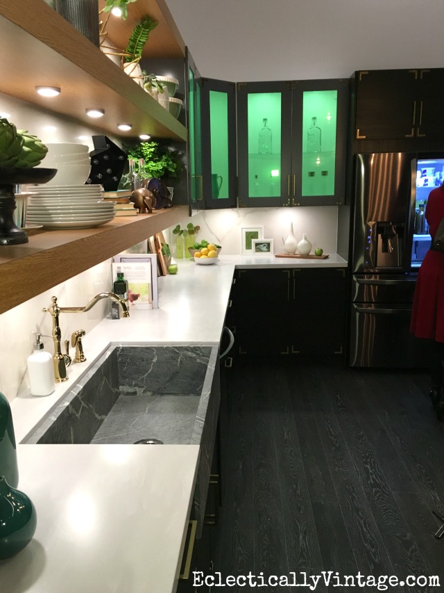 Love this modern kitchen and the green glass cabinets (use a film for no commitment pop of color) kellyelko.com