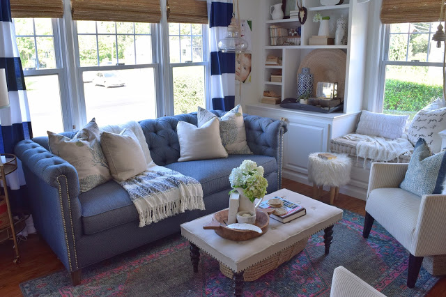 Love this cozy living room with blue Chesterfield sofa kellyelko.com