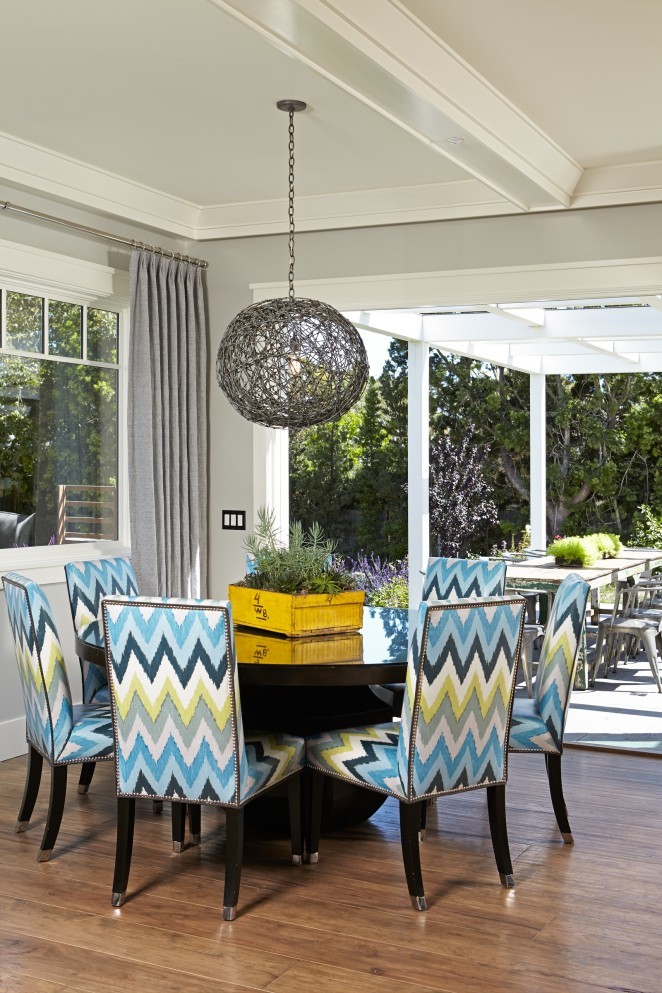 Love the colorful chevron chairs and that fun orb light fixture kellyelko.com