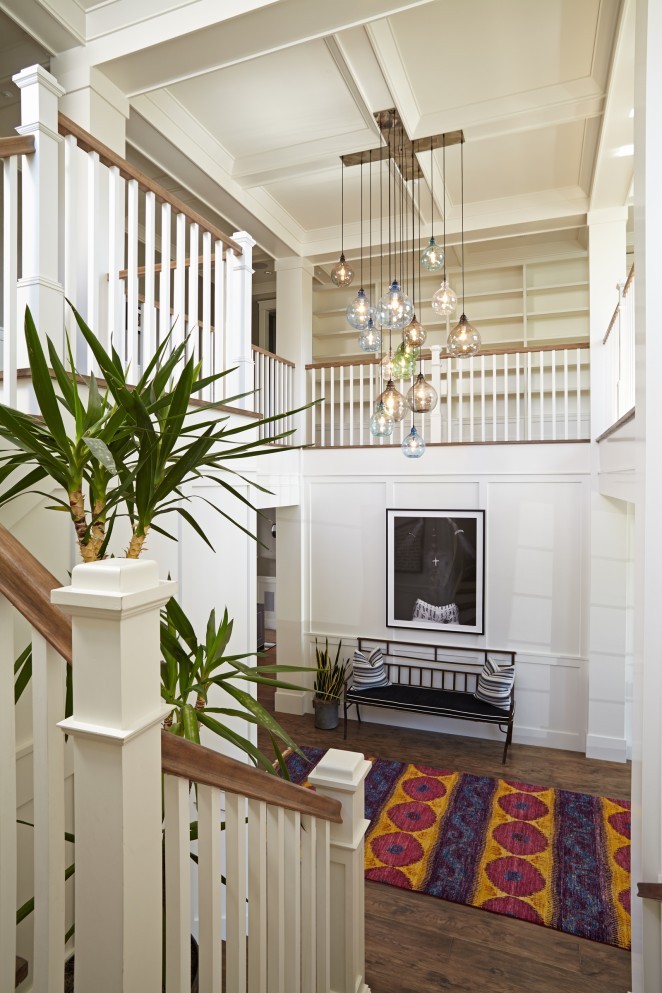 Dramatic entry foyer - look at that stunning glass chandelier kellyelko.com