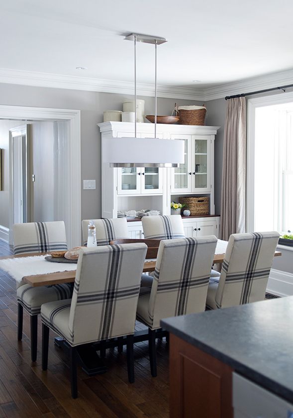 Farmhouse kitchen - love the blue and white chairs and white hutch kellyelko.com