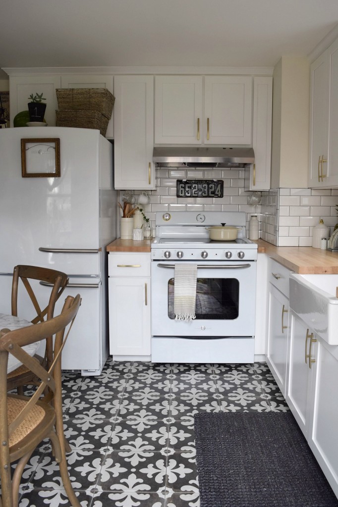 Beautiful small white kitchen with graphic impact from tile kellyelko.com