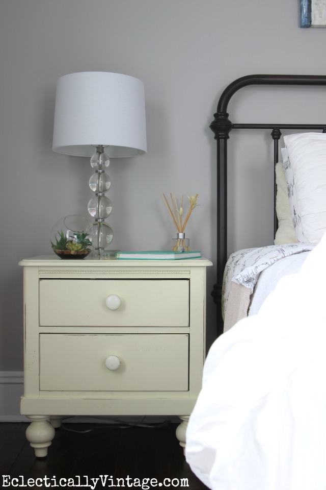 Love the gray walls and black vintage style bed kellyelko.com