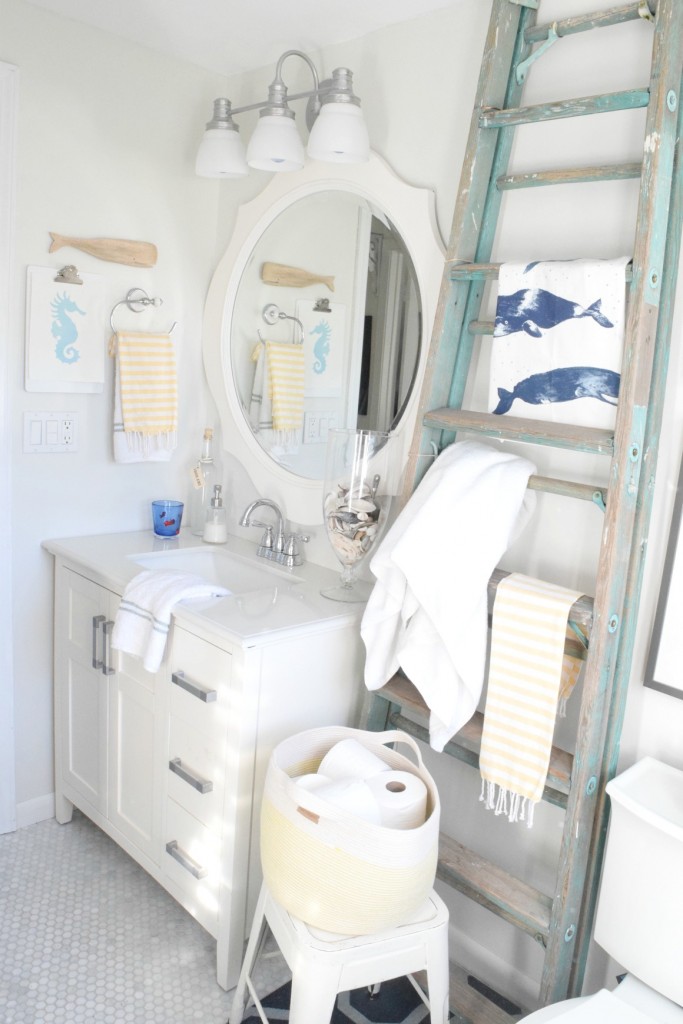 Nautical bathroom with old blue ladder towel holder kellyelko.com