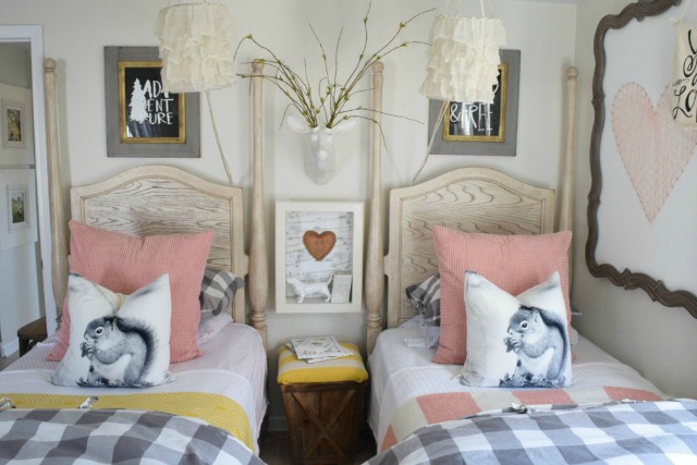 Cute girls bedroom with two twin beds - love the squirrel pillows kellyelko.com