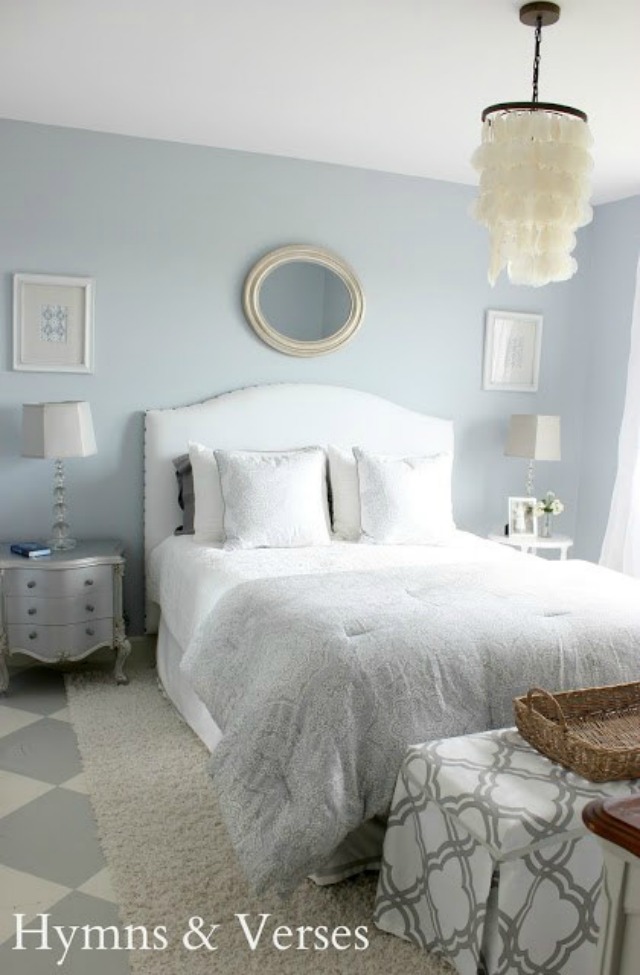 Beautiful blue bedroom - love the DIY upholstered headboard and capiz chandelier kellyelko.com