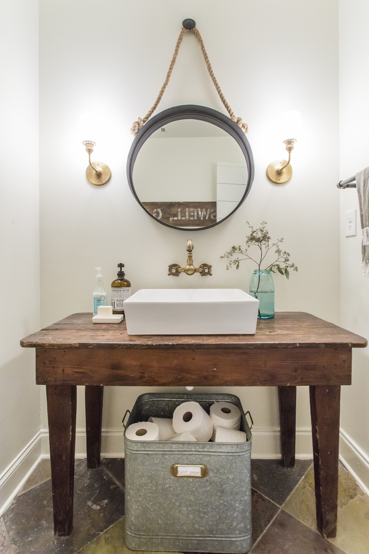 Vessel sink with a rustic wood farmhouse table - love the unpolished brass faucet kellyelko.com