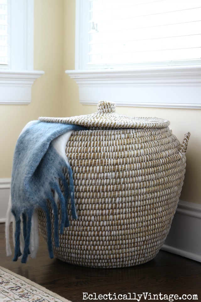 Woven basket with lid is perfect storage for extra throws and pillows kellyelko.com