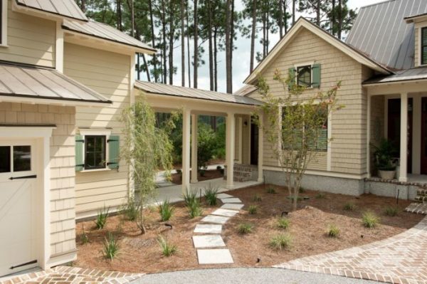 Coastal home exterior - love the covered walkway connecting the house to the garage kellyelko.com