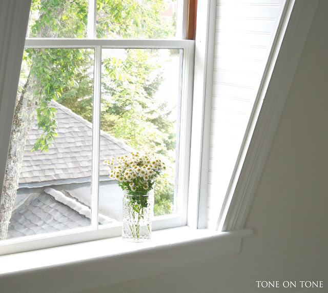 Dormer windowsill with flowers kellyelko.com