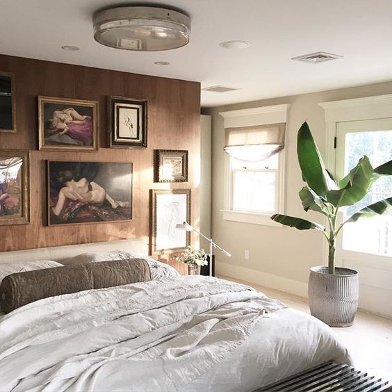 Modern master bedroom - love the art and the huge plant kellyelko.com