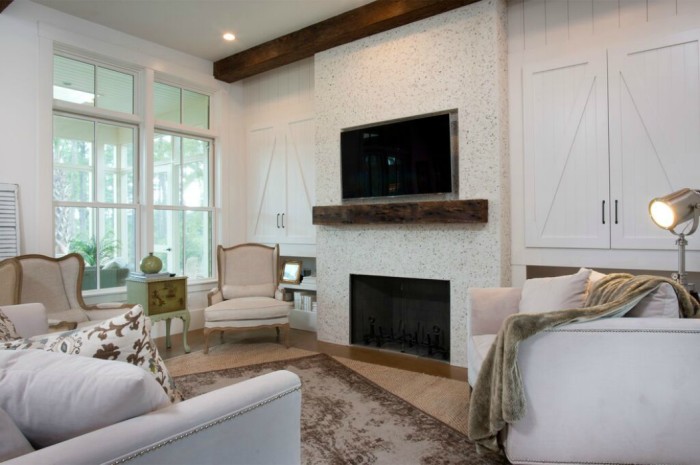 Tabby shell mantel makes a stunning focal point in this coastal home kellyelko.com