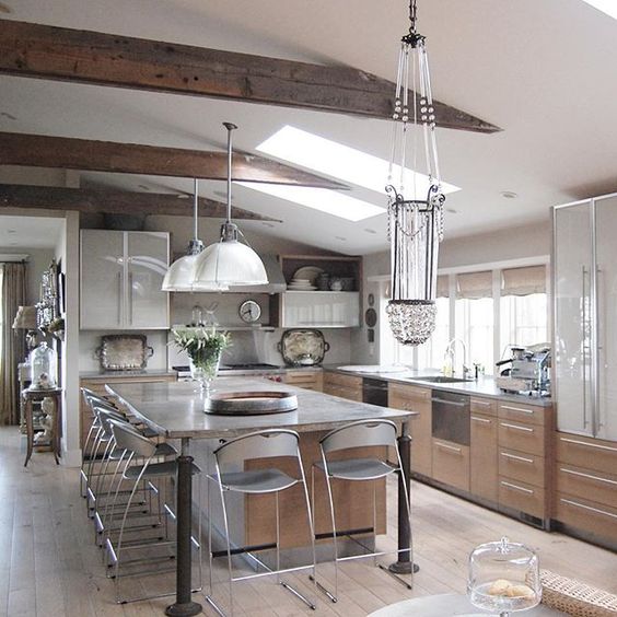 Modern kitchen with rustic beams and wood floor kellyelko.com
