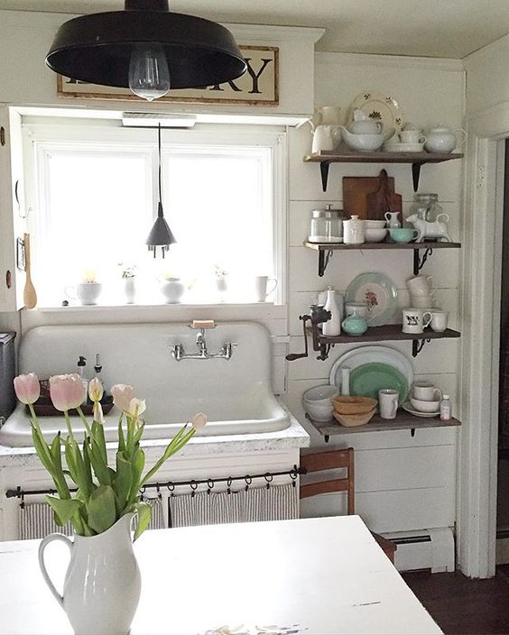 Antique kitchen sink, shiplap walls and open shelving in this farmhouse tour kellyelko.com