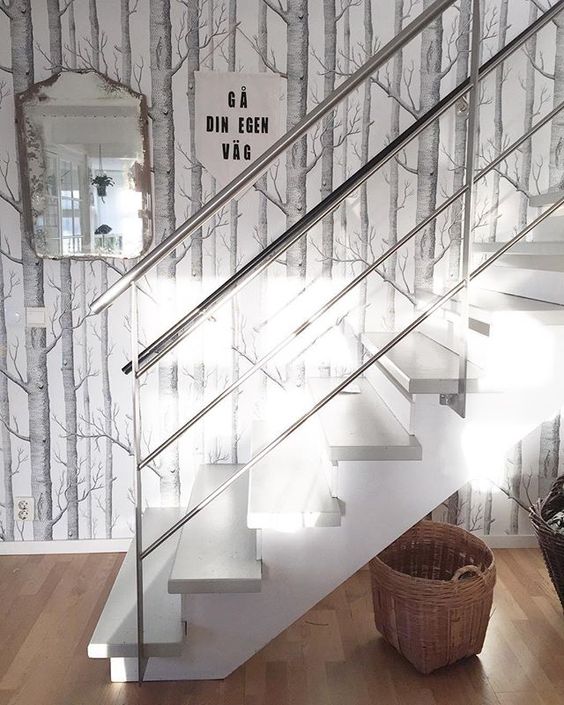 Love the birch tree wallpaper on this staircase kellyelko.com