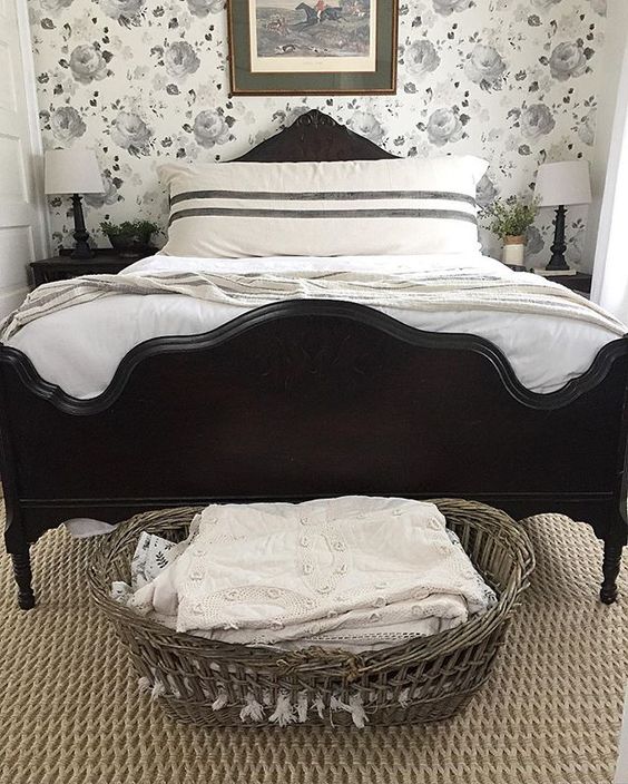 LOVE this black and white bedroom with antique bed and floral wallpaper kellyelko.com