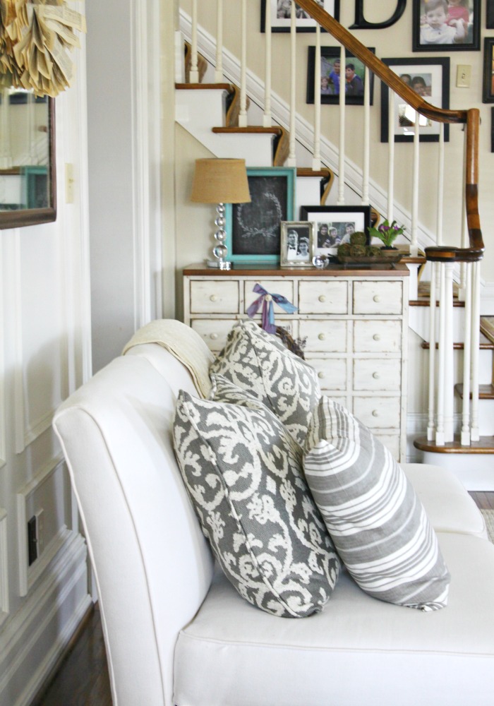 Neutral living room - love the gray pillows kellyelko.com