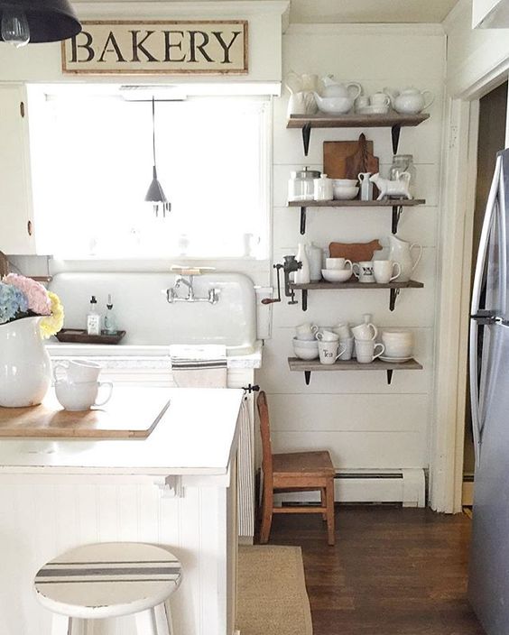 Eclectic Home Tour - love this 1918 Dutch Colonial filled with character like the original kitchen sink kellyelko.com