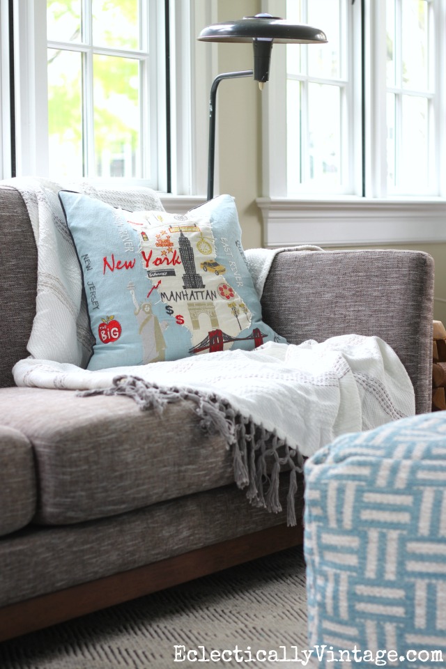 Love this cozy sofa, throw, pillow and pouf kellyelko.com