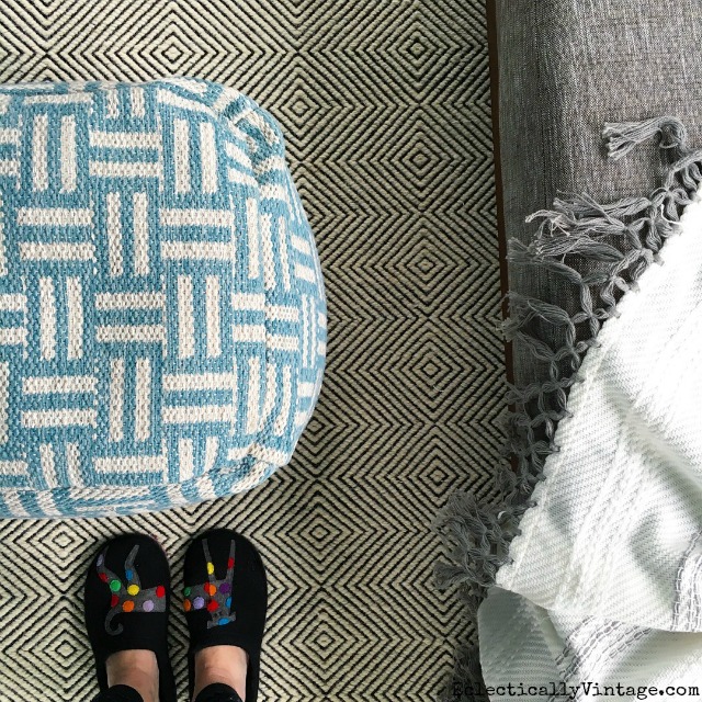 Love the pattern mix in this graphic rug and pouf kellyelko.com