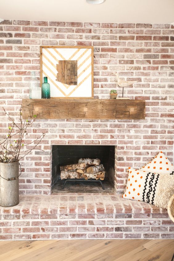 Brick fireplace with antique beam mantel kellyelko.com