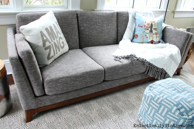 Love this modern gray sofa and rug kellyelko.com