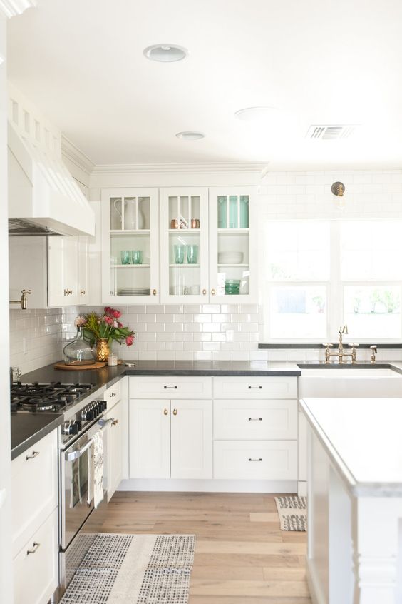 Tour this stunning home with classic white kitchen, subway tile and glass cabinets kellyelko.com 