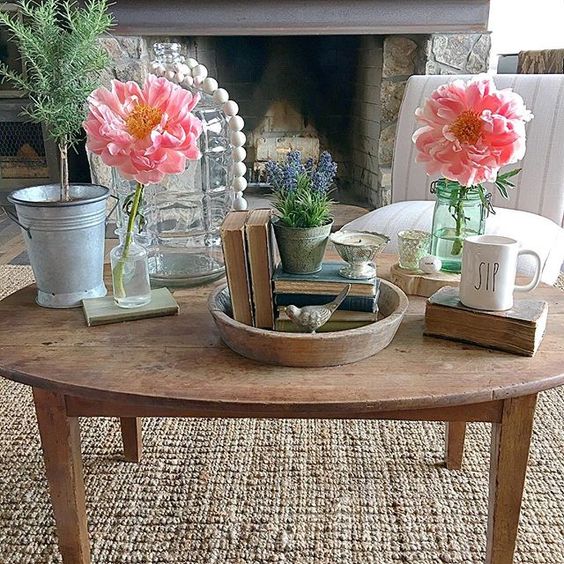 Farmhouse coffee table - love the pink peonies kellyelko.com