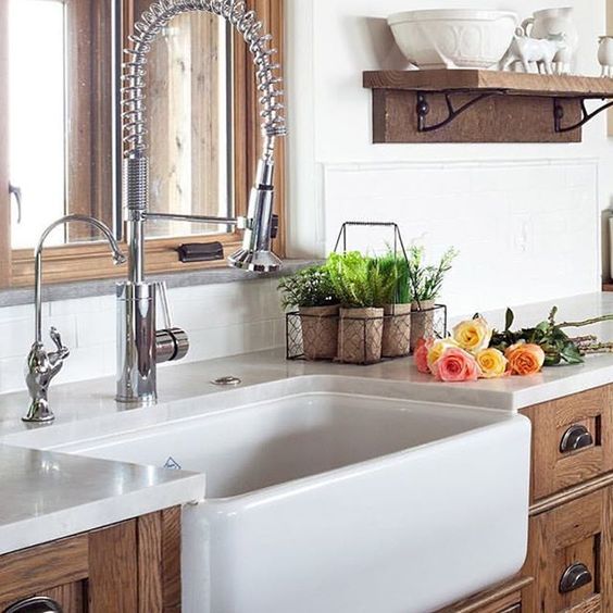Love the farmhouse sink paired with a modern gooseneck faucet kellyelko.com