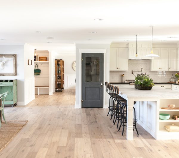 Open floor plan kitchen dining area - love the pantry door kellyelko.com