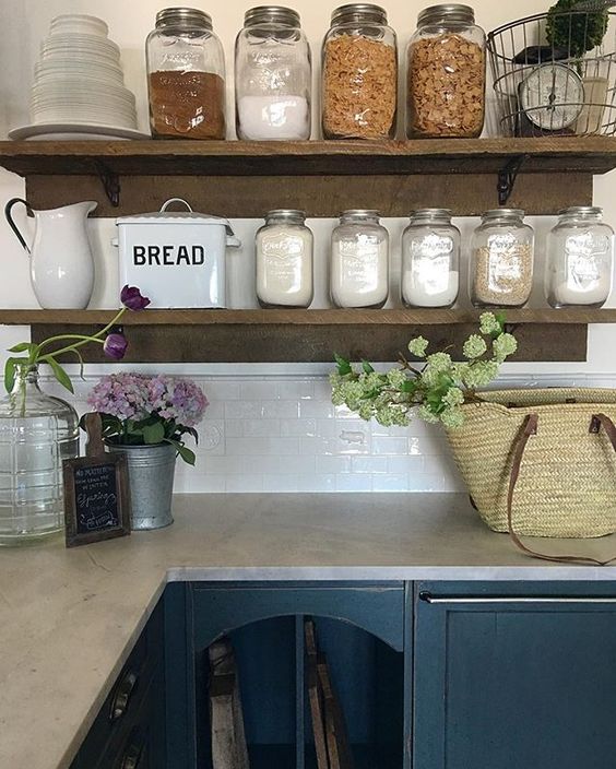 Love these rustic kitchen shelves for storing everyday essentials in mason jars kellyelko.com