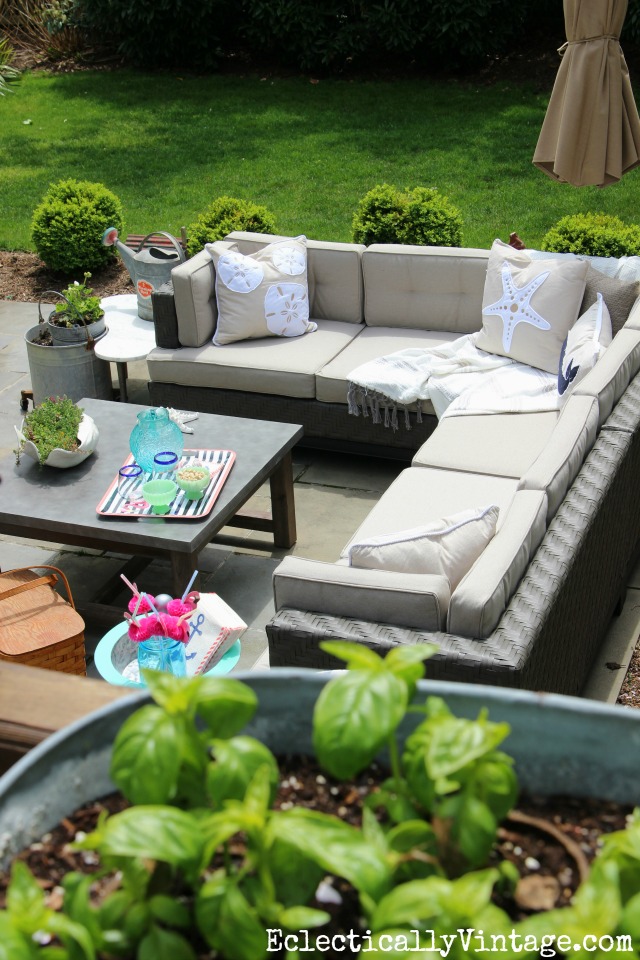 Love this cozy outdoor sectional sofa and concrete coffee table kellyelko.com