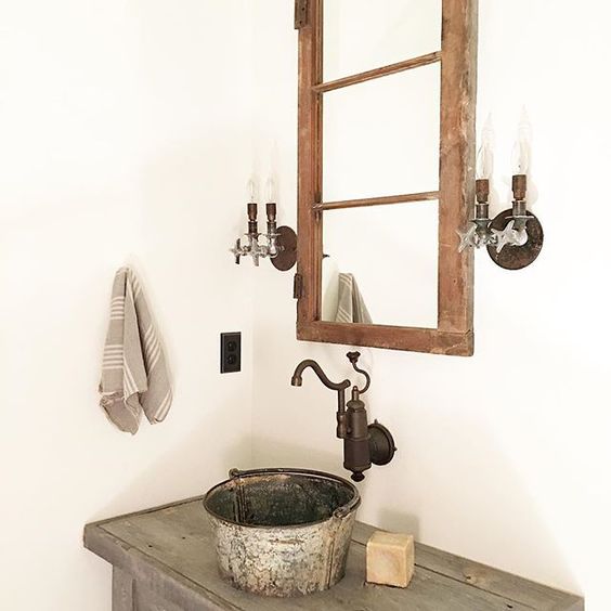 Use an old galvanized bucket as a sink kellyelko.com