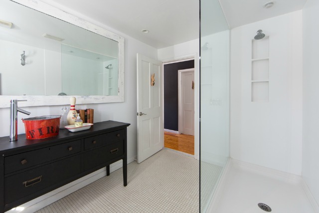 Love this white bathroom with dark wood vanity and fun bucket sink kellyelko.com