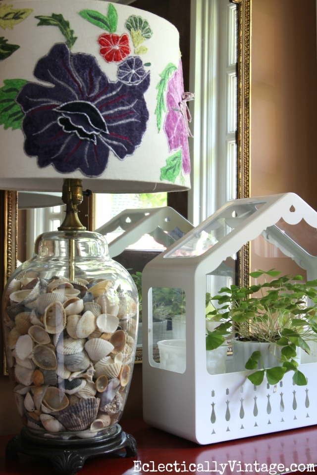 Love this glass lamp filled with shells kellyelko.com