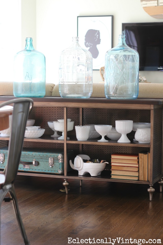 Love the glass water jugs and vintage milk glass collections kellyelko.com