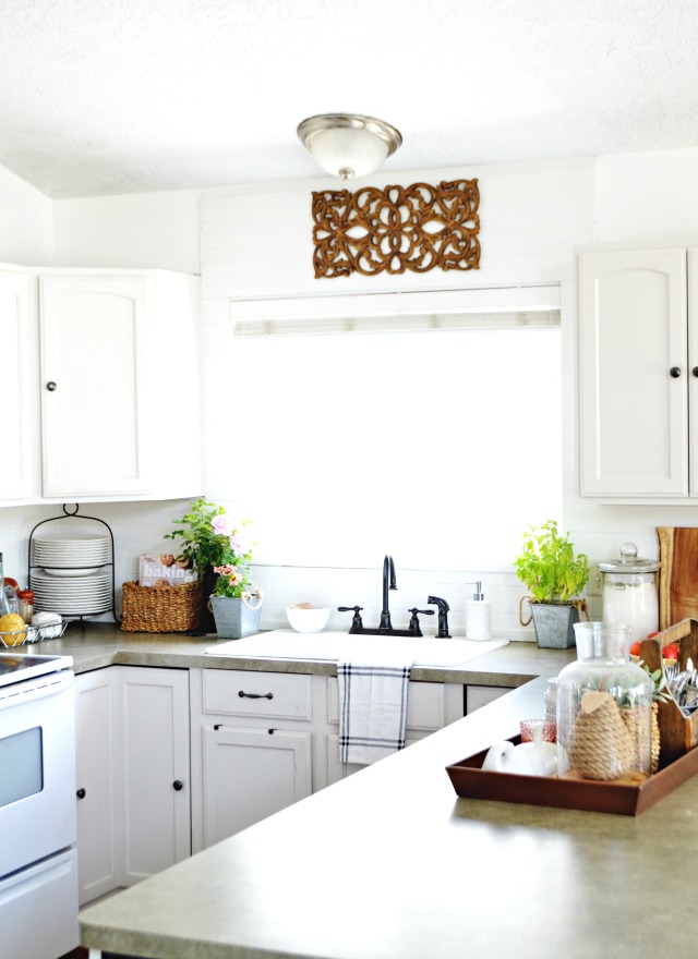 Love this white kitchen done on a budget kellyelko.com