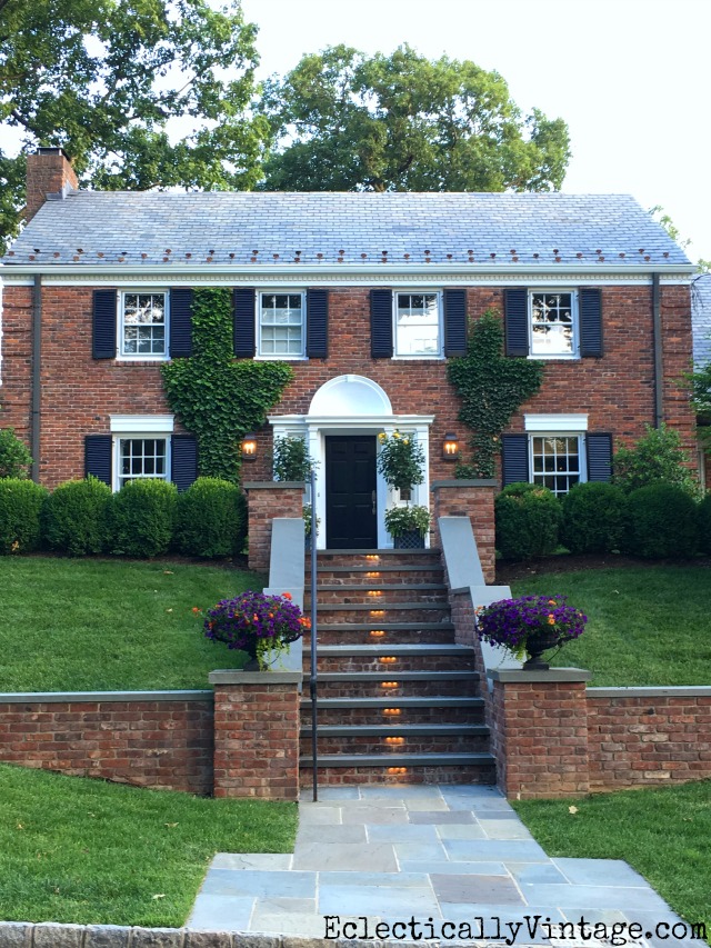 Love this brick colonial with ivy covered walls and classic planters kellyelko.com