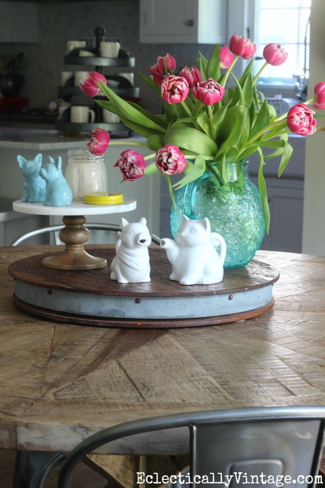 Love this beautiful centerpiece of tulips in a vintage pitcher kellyelko.com