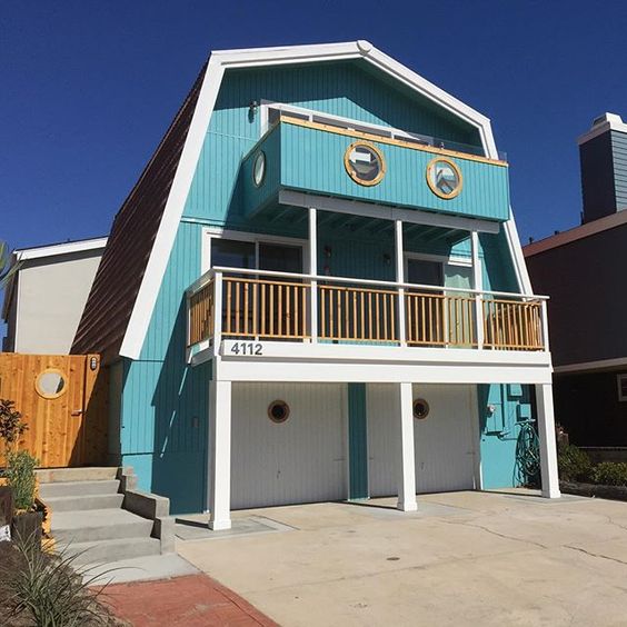 Whimsical Beach House - she turned this 1970's A-frame house into a colorful, eclectic, mid century beauty! kellyelko.com