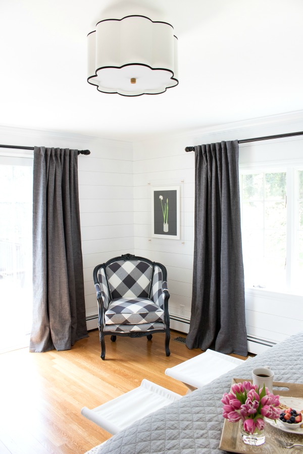 Love this gray, white and black bedroom - the oversized check fabric on the chair is gorgeous kellyelko.com