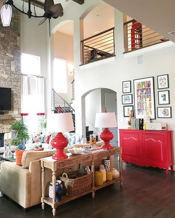 Colorful family room - love the pops of red! kellyelko.com