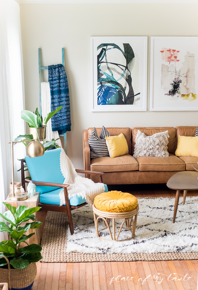 Boho family room - love the mid century sofa and modern art kellyelko.com