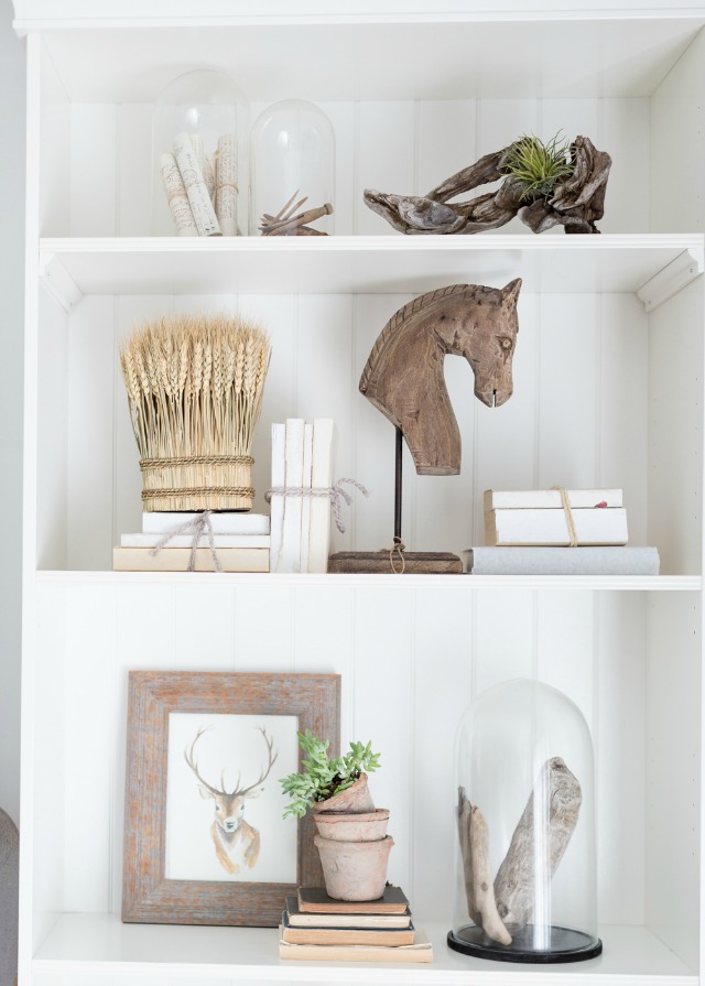 Styled shelves with rustic wood and cloches kellyelko.com