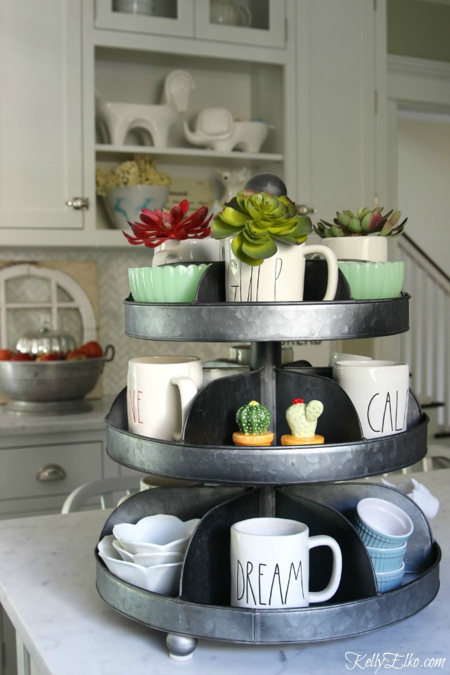Display your everyday items in a tiered tray on the kitchen counter kellyelko.com