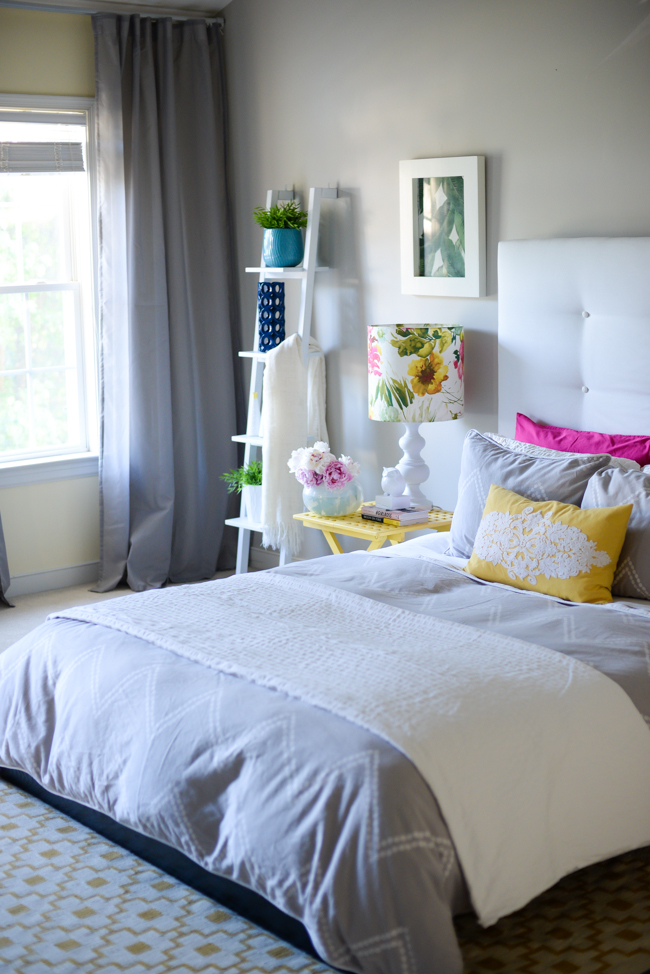 Modern gray bedroom - love the colorful pillows kellyelko.com