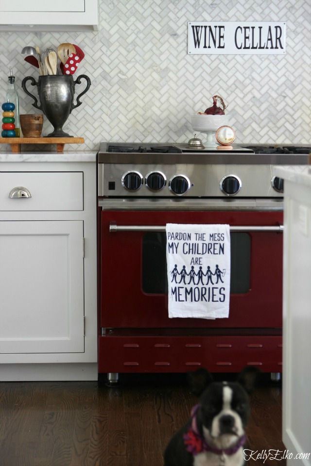 Love this red stove and the herringbone carrara marble backsplash kellyelko.com