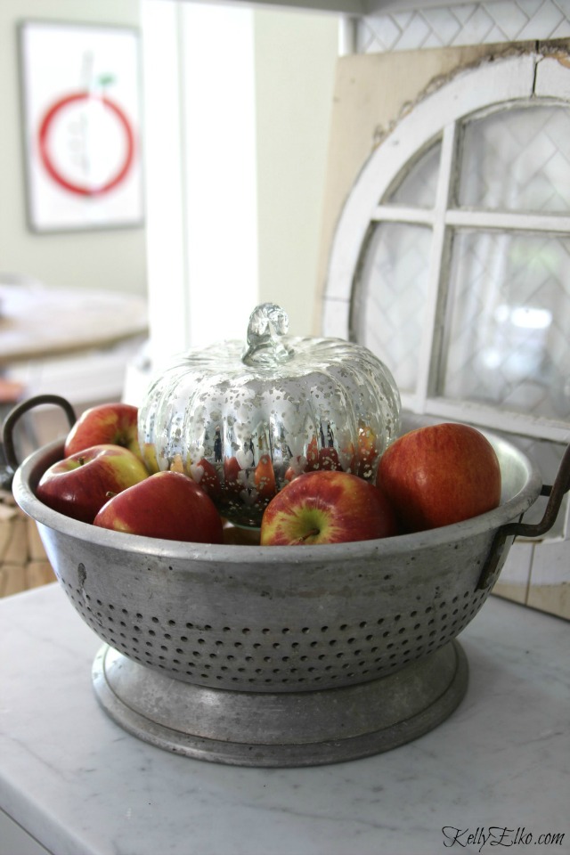 Vintage colander with apples and mercury glass pumpkin kellyelko.com