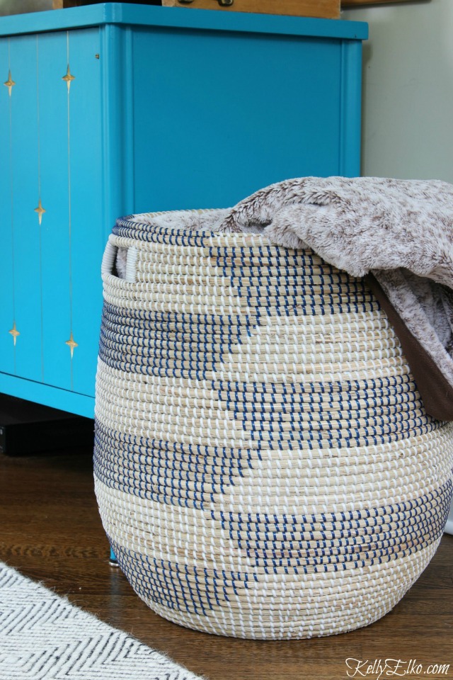 Woven basket is perfect for storing blankets and throws kellyelko.com